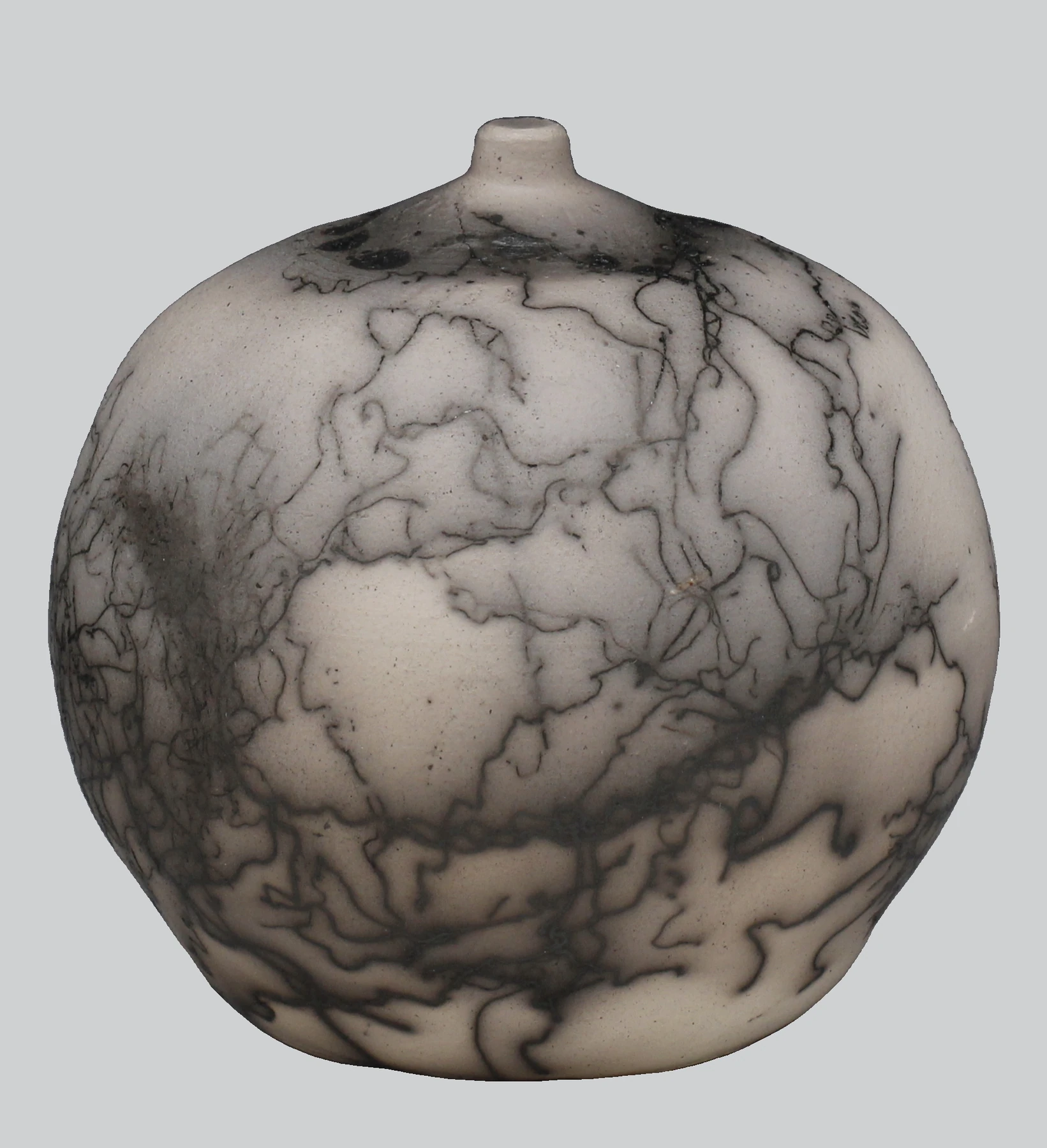 Aching breast, a bottle, horsehair raku